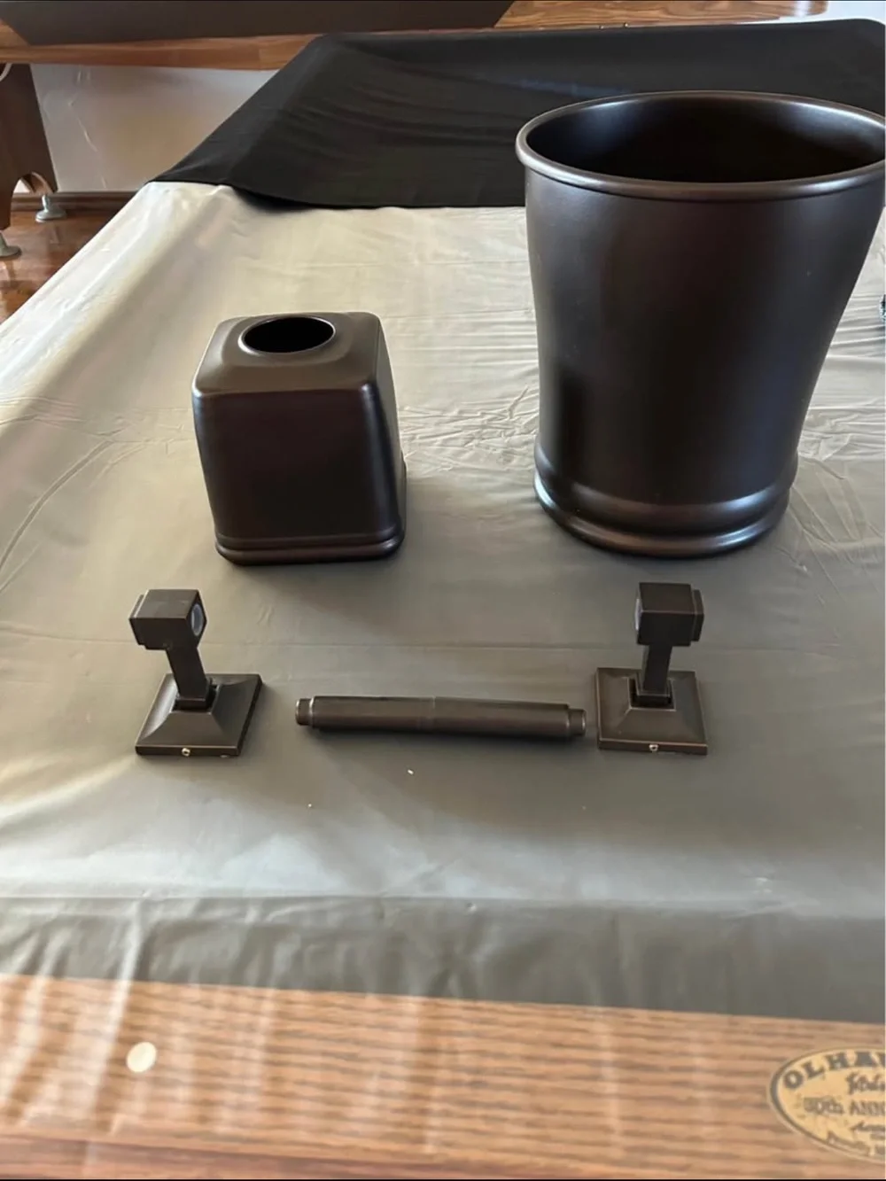 Restoration Hardware toilet paper holder with other accessories.